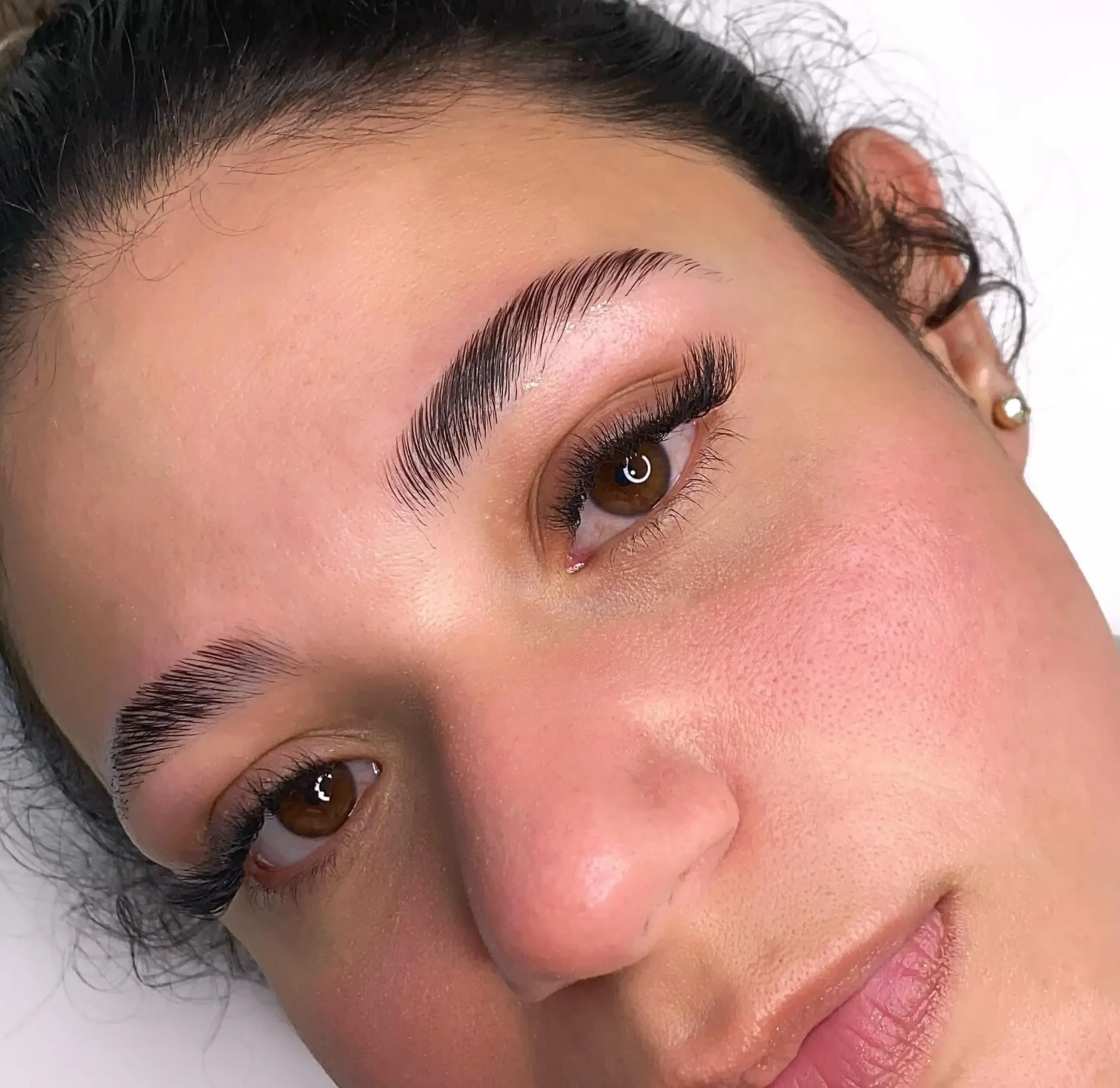 hair grow over eyebrow tattoo